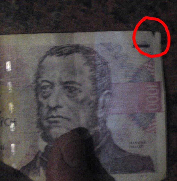 Po�kozen� bankovka